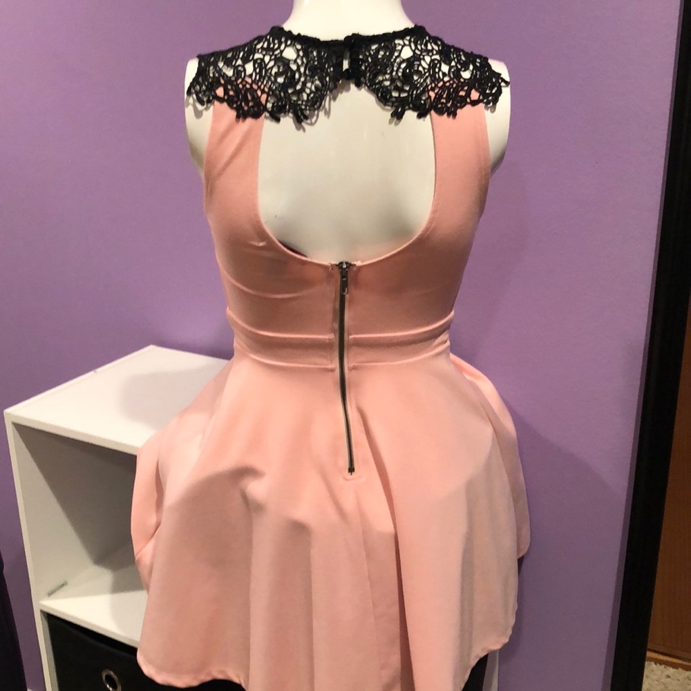 Material Girl size XS peach dress with black lace.